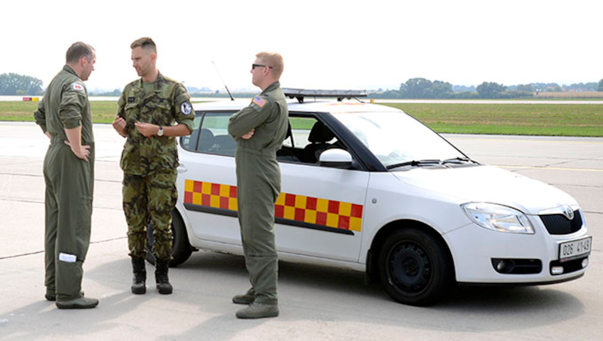 Lt. Col. Edward Conner, KC-135R instructor pilot, 155th Air Refueling Wing, Nebraska Air National Guard and 1st Lt. Taylor Ashmore,155th ARW mission pilot, debrief a grounds service technician assigned to Pardubice Air Base, Czech Republic, after a refueling flight during a joint training exercise in the Pardubice Region. This year the State of Nebraska, and the State of Texas, are celebrating the 25th year of their partnership with the Czech Republic through the State Partnership Program (SPP).The SPP has been building relationships for over 20 years and includes 73 unique security partnerships involving 79 nations around the globe. (U.S. Air National Guard photo by Tech. Sgt. Rana Franklin)