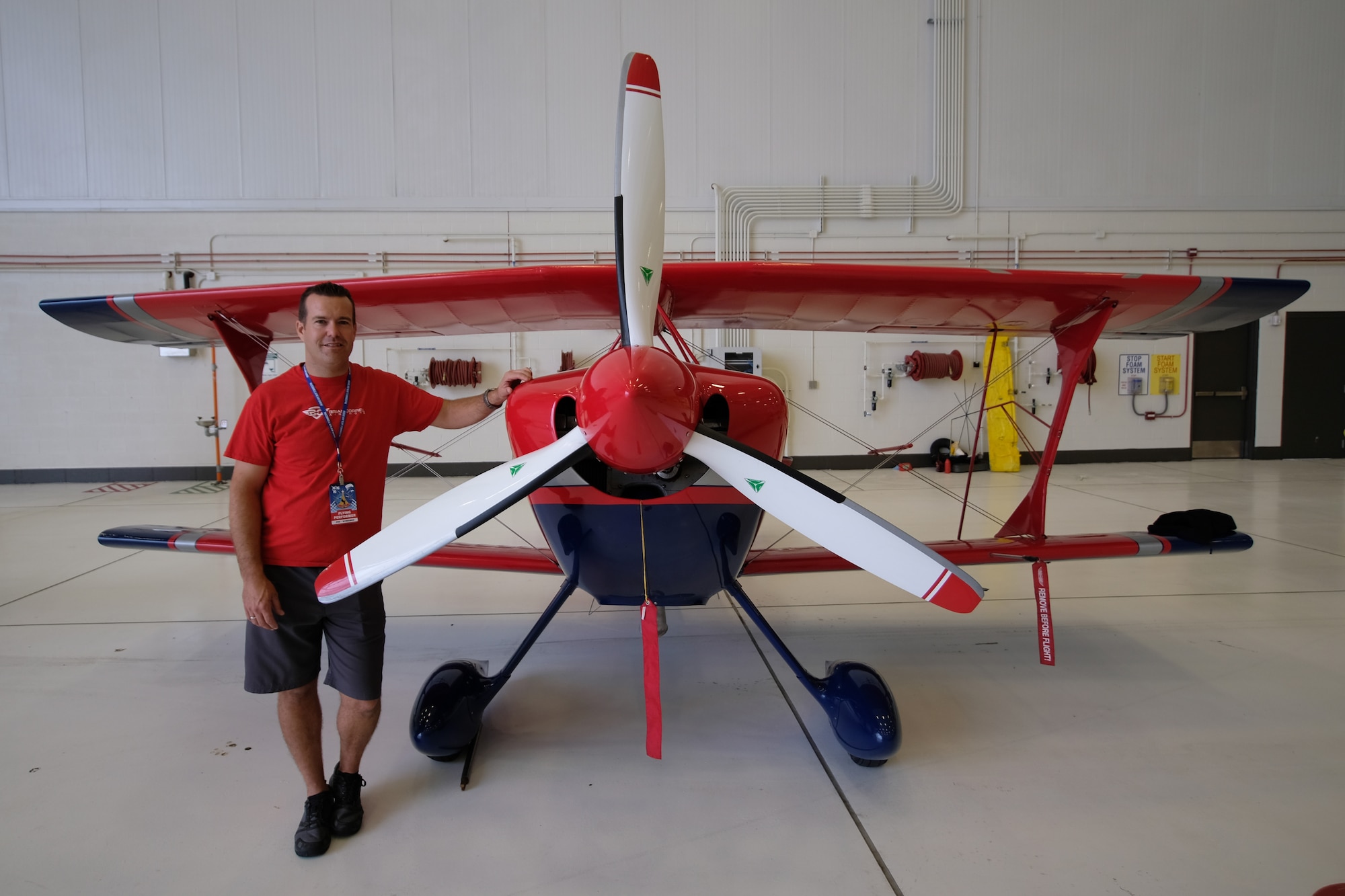 Maj. Brian Correll, 18th Air Refueling Squadron instructor pilot, stands next to his modified Pitts S2S Sept. 7, 2018, McConnell Air Force Base, Kan.