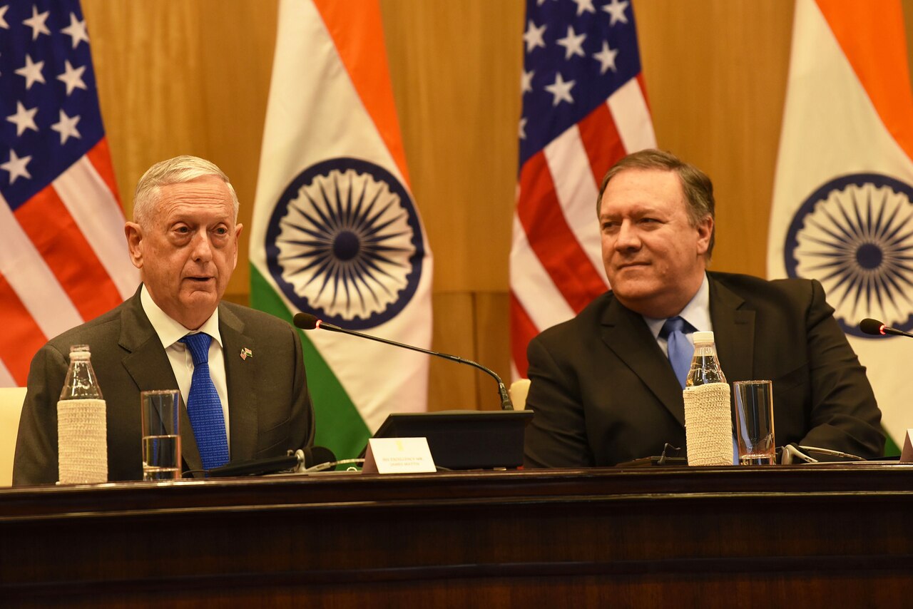 Secretaries of Defense and State talk to reporters.