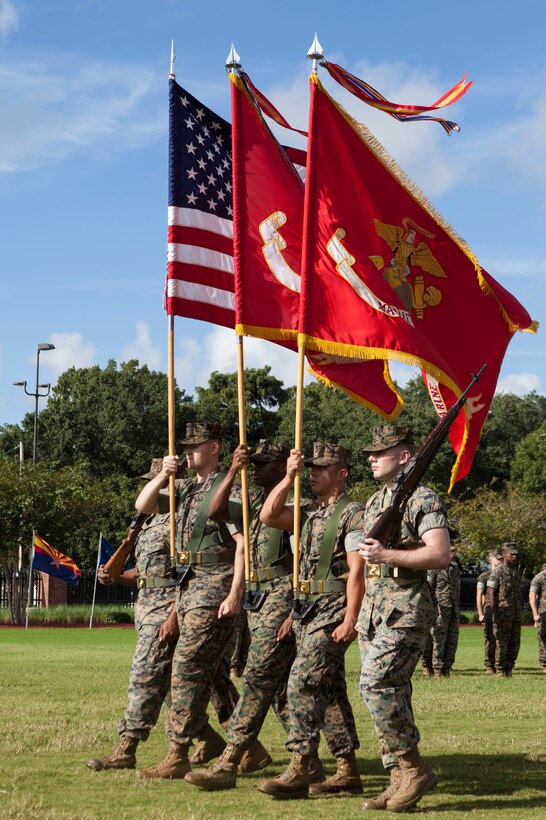 The Marine Forces Reserve and Marine Forces North color guard, march on the colors during the change of command ceremony Sept. 8, 2018, at Marine Corps Support Facility New Orleans. Lt. Gen. Rex C. McMillian, outgoing commander of MARFORRES and MARFORNORTH, relinquished his duties to Maj. Gen. Burke W. Whitman. (U.S. Marine Corps photo by Lance Cpl. Tessa D. Watts)