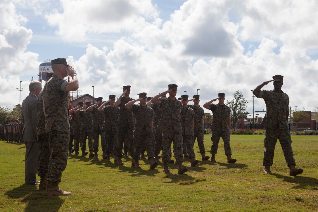 Marines honor Maj. Gen. Burke W. Whitman, incoming commander of Marine Forces Reserve and Marine Forces North during the change of command ceremony Sept. 8, 2018, at Marine Corps Support Facility New Orleans. Whitman assumed command from Lt. Gen. Rex C. McMillian, outgoing commander of MARFORRES and MARFORNORTH. (U.S. Marine Corps photo by Lance Cpl. Tessa D. Watts)