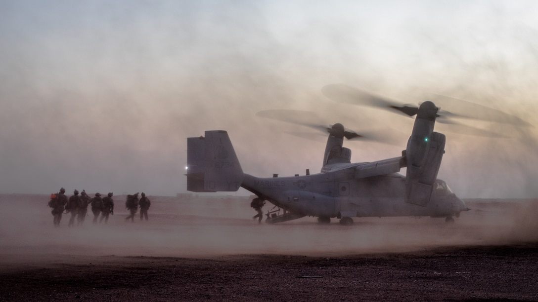 U.S. Marines with India Company, 3rd Battalion 7th Marine Regiment attached to Special Purpose Marine Air-Ground Task Force, Crisis Response-Central Command board an MV-22 Osprey during a tactical recovery of aircraft and personnel exercise August 19, 2018. The exercise provided Marines with realistic training to enhance combat readiness and crisis response skills.