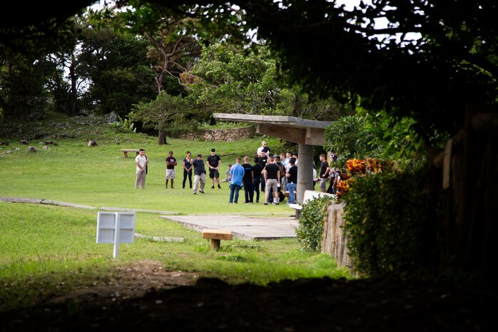 Chris Majewski, a tour guide, describes the details of the conflict on Hacksaw Ridge with Marines and Sailors during a tour Sept. 7, 2018 at Hacksaw Ridge, Okinawa, Japan. Marines and Sailors with Headquarters Company, Headquarters Regiment, 3rd Marine Logistics Group, participated in the World War II battle site tour to learn about the U.S. Marine Corps’ history on Okinawa and remember those who have gone before them. Majewski is a tour guide with Marine Corps Community Services Tours+ and is a native of Boulder City, Nevada. (U.S. Marine Corps photo by Pfc. Terry Wong)