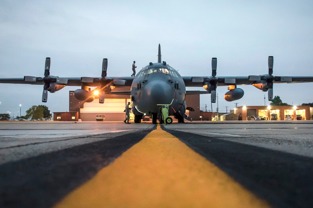 Airmen prepare a C-130H Hercules aircraft during daily routine preflight operation.