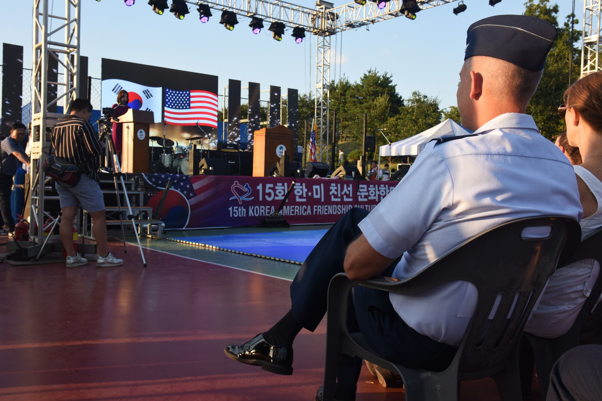 U.S. Air Force Col. Kevin Mantovani, 51st Mission Support Group commander, watches the upcoming performances during the opening ceremony of the 15th annual Korean-American Friendship Cultural Festival at the Songtan Entertainment District, Republic of Korea, Sept. 8, 2018. The two-day festival features traditional Korean and American food and entertainment to help both cultures learn more about each other. (U.S. Air Force photo by Tech Sgt. Ashley Tyler)