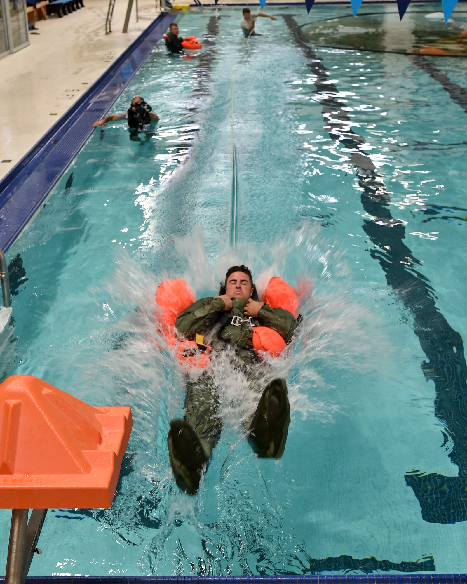 Reserve Citizen Airmen belonging to air crews are required to know how to escape a parachute that is dragging them during emergency situations in open water.