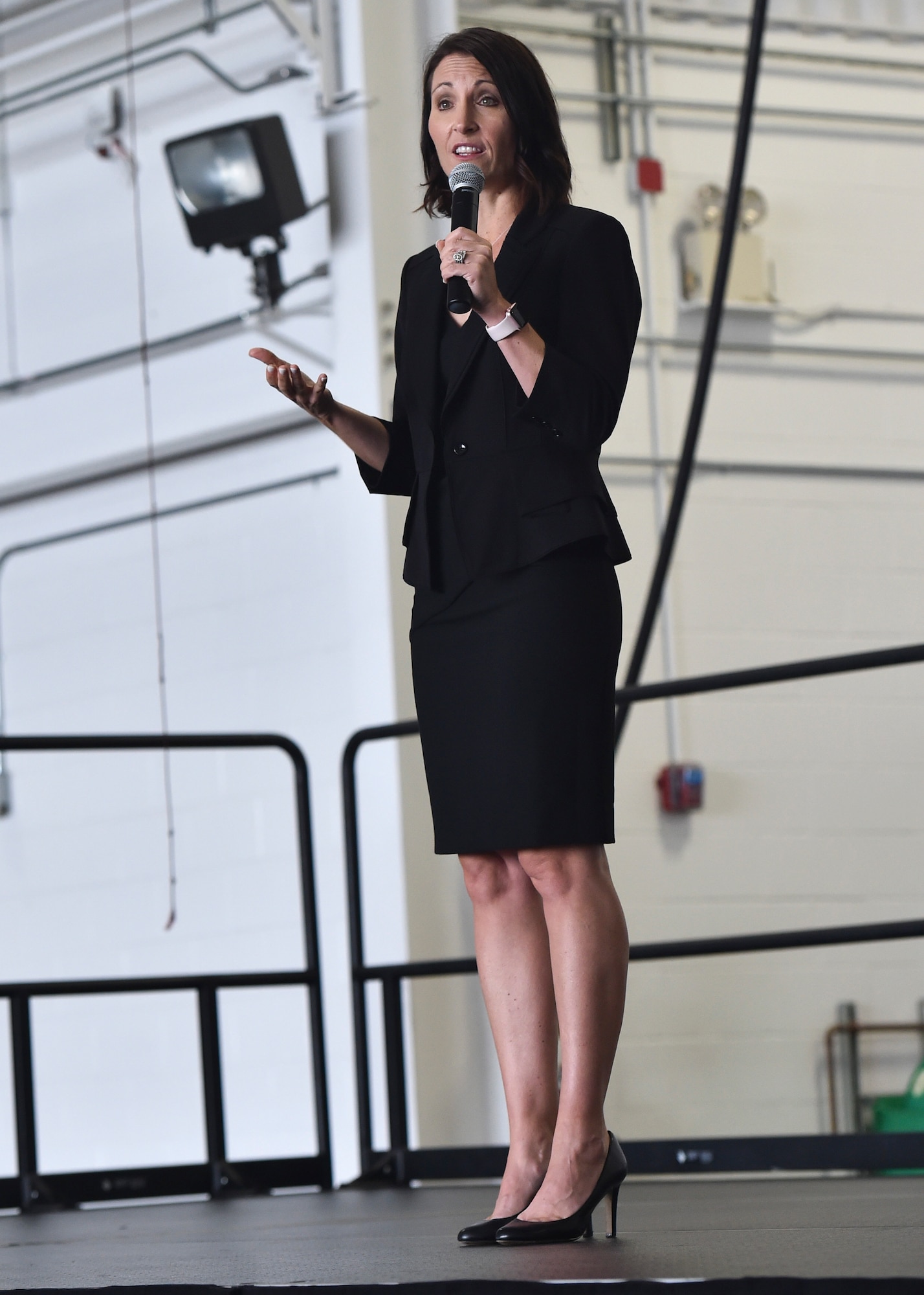 Dr. Jannell MacAulay, a leadership and performance consultant and retired U.S. Air Force Lt. Col., speaks on stress management during a commanders call in Hangar 295, Youngstown Air Reserve Station, September 8, 2018. MacAulay is a wellness educator, yoga instructor, mindfulness researcher, and holds a certificate in plant based nutrition. She specializes in improving the performance of the members of high-stress organizations through a focus on nutrition, physical and mental fitness, human connection and values discovery.