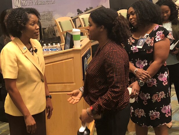 IMAGE: KING GEORGE, Va. (Aug. 30, 2018) – Stefanie Easter, director of Navy Staff for the Office of the Chief of Naval Operations, left, and Candace Deloach, Naval Surface Warfare Center Dahlgren Division (NSWCDD) computer scientist, discuss diversity at the first Leadership in a Diverse Environment Training Event hosted by Naval Surface Warfare Center Dahlgren Division. Easter shared her personal and professional experiences surrounding diversity, inclusion, leadership and respect in her presentation entitled, “Lead Where You Are in a Diverse Environment.”