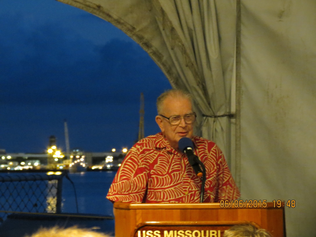 Alan Lloyd captivates the audience during the Battle of Midway Gala on the USS Missouri