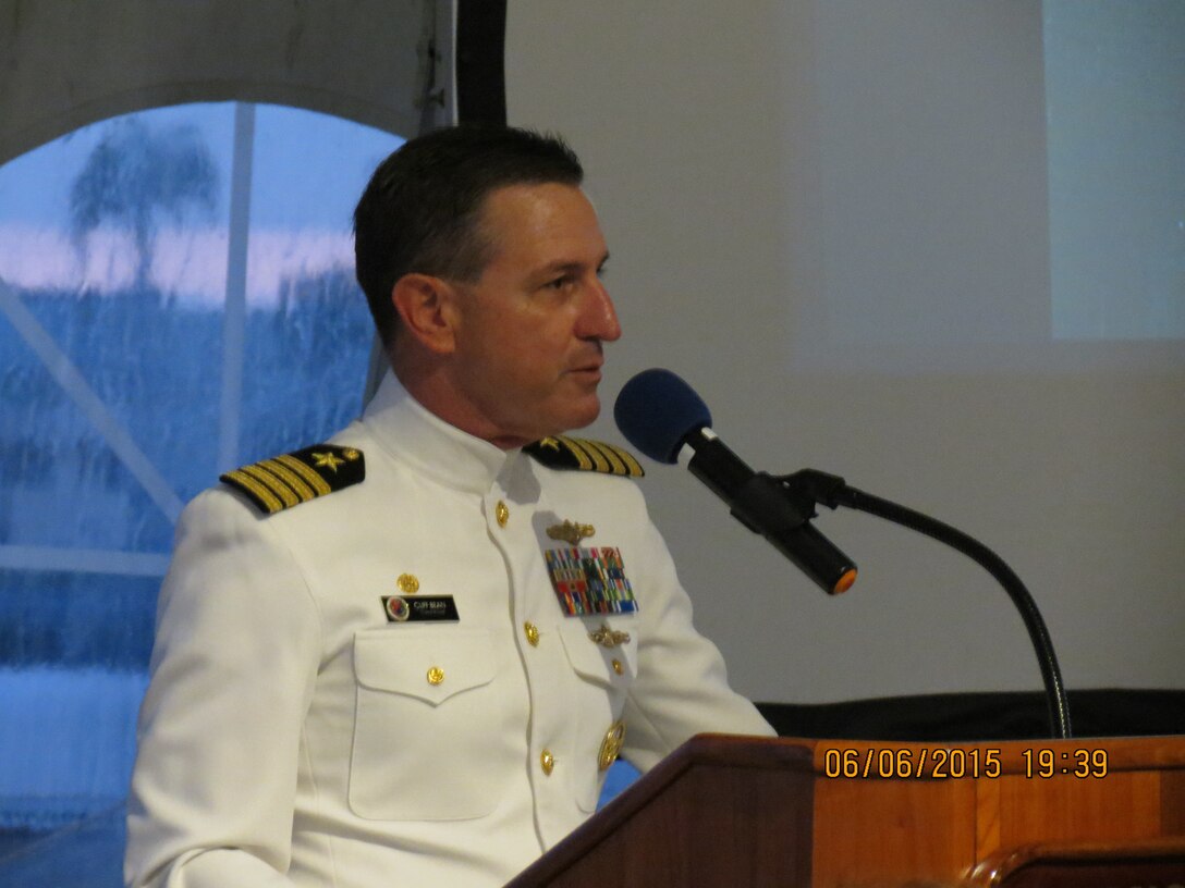 Capt Cliff Bean, Command of NSA Hawaii, greets guests and introduces the keynote speaker for the evening