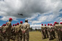 U.S. Air Force Airmen stand in a formation during the opening ceremony of the Colombian led search and rescue exercise, Angel de los Andes, at Air Combat Command number 5 at Arturo Lema Posada Air Base in Rionegro, Colombia, Sept. 3, 2018.