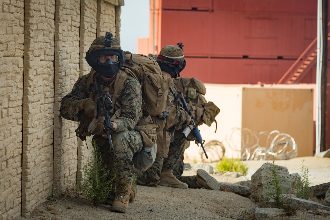U.S. Marines with 2nd Battalion, 7th Marine Regiment, provide security during a patrol for the 1st Marine Division (MARDIV) Super Squad Competition at Marine Corps Base Camp Pendleton, California, Aug. 29, 2018.