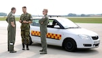 Lt. Col. Edward Conner, KC-135R instructor pilot, 155th Air Refueling Wing, Nebraska Air National Guard, and 1st Lt. Taylor Ashmore,155th ARW mission pilot, debrief a grounds service technician assigned to Pardubice Air Base, Czech Republic, after a refueling flight during a joint training exercise in the Pardubice Region. This year the State of Nebraska, and the State of Texas, are celebrating the 25th year of their partnership with the Czech Republic through the State Partnership Program (SPP).The SPP has been building relationships for over 20.