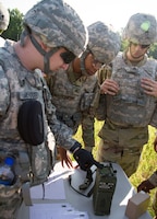 FORT KNOX, Ky. – 1st Theater Sustainment Command Soldiers learn how to put together a Single Channel Ground and Airborne Radio System (SINCGARS), July 12. Upon completing the SINCGARS, the Soldiers are able to call for a 9-Line air medical evacuation request. (U.S. Army photos by Mr. Brent Thacker)