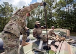 South Carolina National Guard Soldiers from the 118th Forward Support Company transfer bulk diesel fuel into M987 HEMTT fuel tanker trucks for distribution in preparation to support partnered civilian agencies and safeguard the citizens of the state in advance of Hurricane Florence, Sept. 10, 2018.  Approximately 800 Soldiers and Airmen have been mobilized  to prepare, respond and participate in recovery efforts as forecasters project Hurricane Florence will increase in strength.