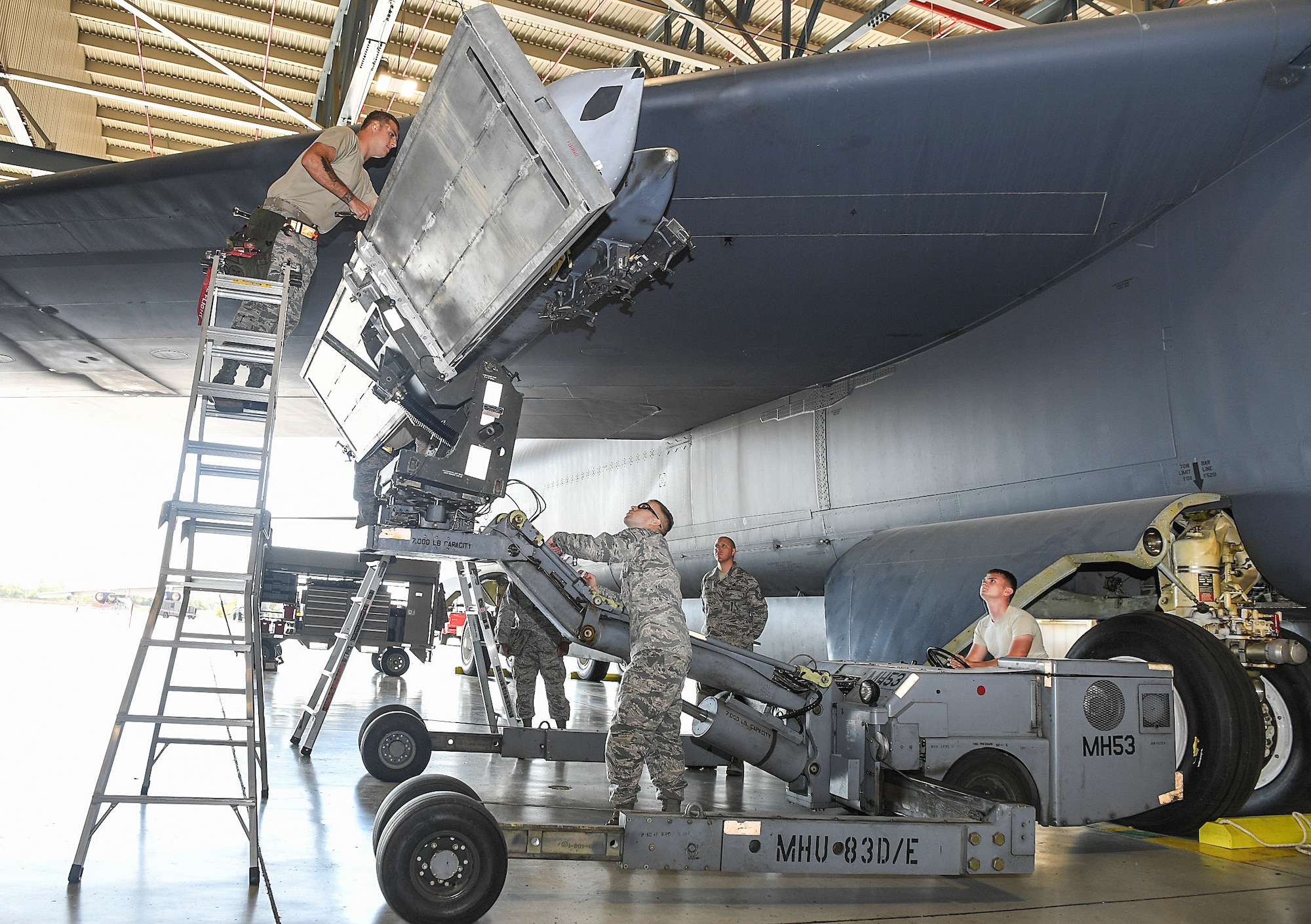 Members of the 5th AMXS competed in a Load Crew of the Quarter Competition at Minot Air Force Base, North Dakota. Two weapons load crews, representing the 23rd and 69th Bomb Squadrons, were timed on their ability to efficiently load an inert munition onto a B-52H Stratofortress. The 5th AMXS hosted the competition to showcase their attention to detail, teamwork, precision and bomb loading proficiency.