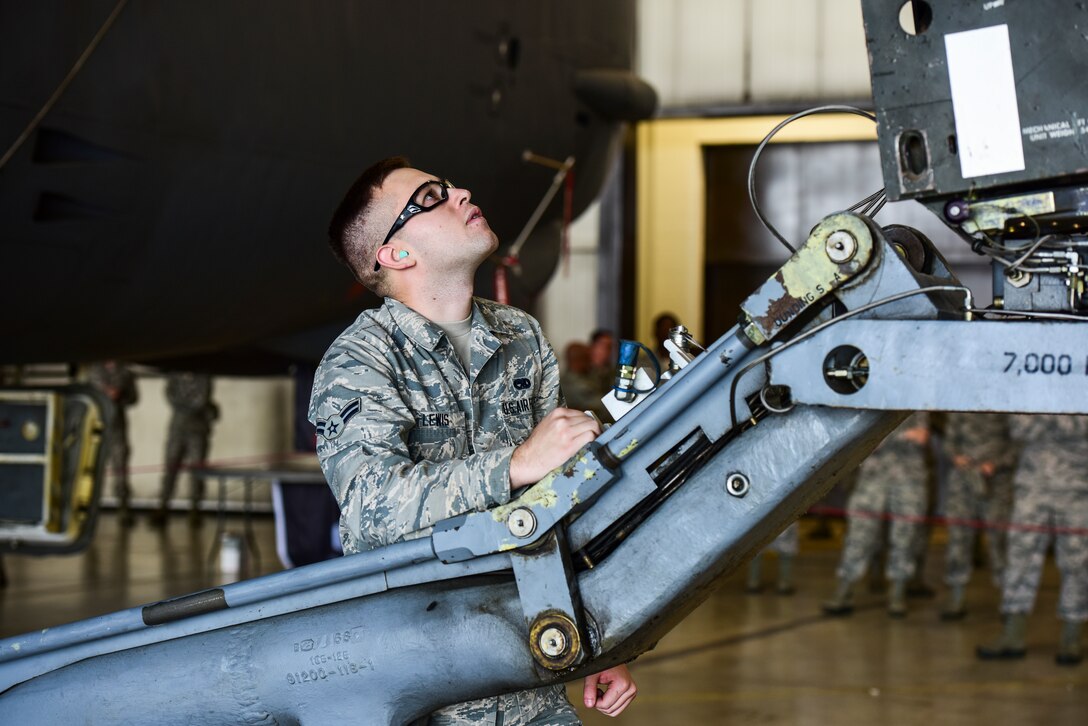Members of the 5th AMXS competed in a Load Crew of the Quarter Competition at Minot Air Force Base, North Dakota. Two weapons load crews, representing the 23rd and 69th Bomb Squadrons, were timed on their ability to efficiently load an inert munition onto a B-52H Stratofortress. The 5th AMXS hosted the competition to showcase their attention to detail, teamwork, precision and bomb loading proficiency.