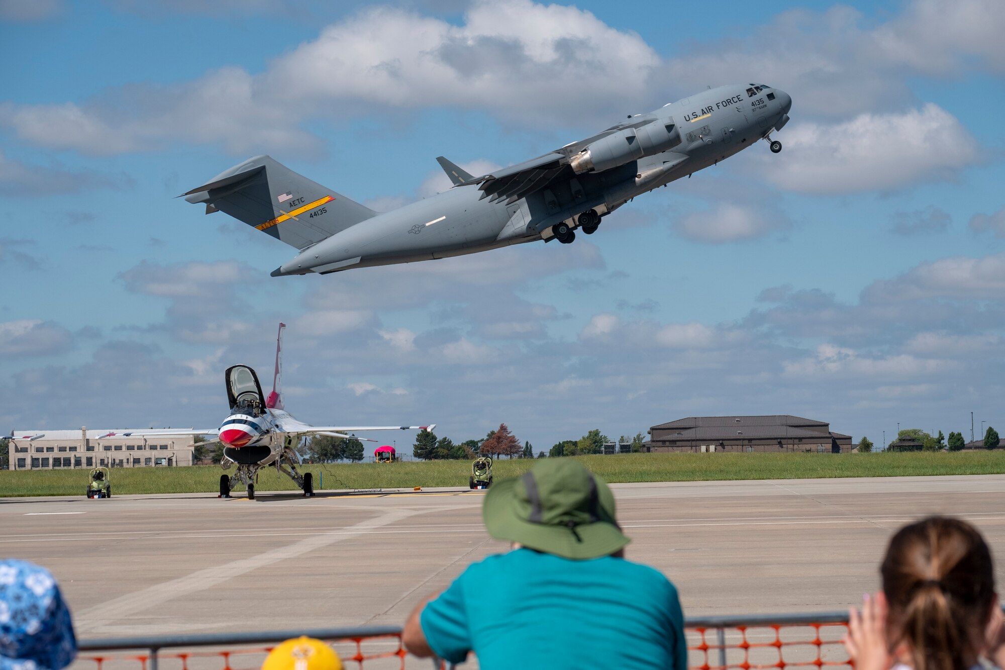 A Team McConnell KC-135 Stratotanker demonstrates its aerial refueling capabilities to spectators at the Frontiers in Flight Open House and Airshow Sept. 9, 2018, McConnell AFB, Kan.  The KC-135 was initially tasked with refueling strategic bombers, but was used extensively in the Vietnam War and later conflicts such as Operation Desert Storm to extend the range and endurance of U.S. tactical fighters and bombers.  (U.S. Air Force photo by Staff Sgt. Preston Webb)
