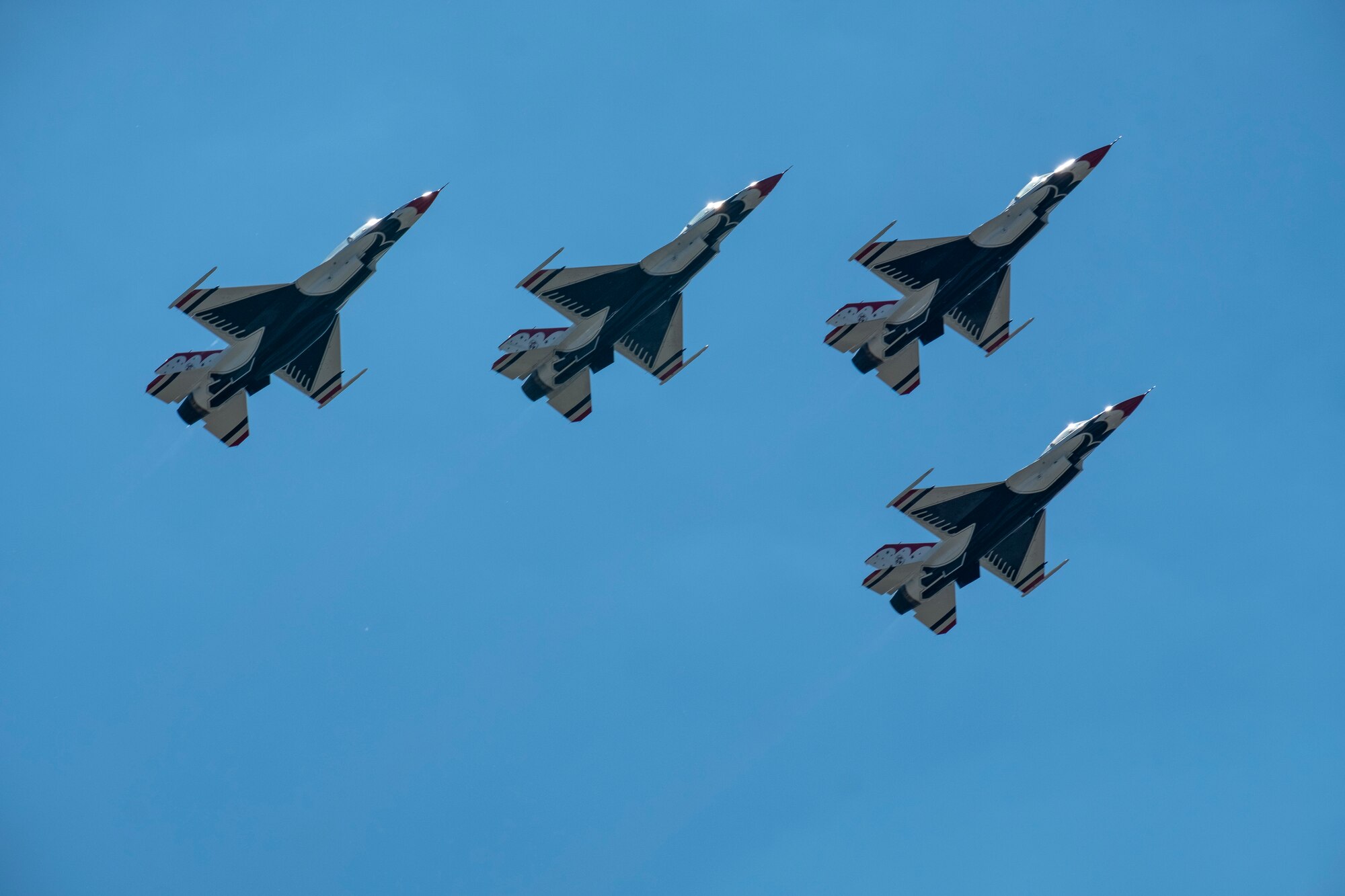 Members of the U.S. Thunderbirds perform for Team McConnell at the Frontiers in Flight Open House and Airshow Sept. 9, 2018, McConnell Air Force Base, Kan. In 1953 the Air Force activated the 3600th Demonstration Unit, which adopted the name “Thunderbirds,” establishing a 55-year heritage of displaying the capabilities of the most powerful Air Force in the world. (U.S. Air Force Photo by Staff Sgt. Preston Webb)