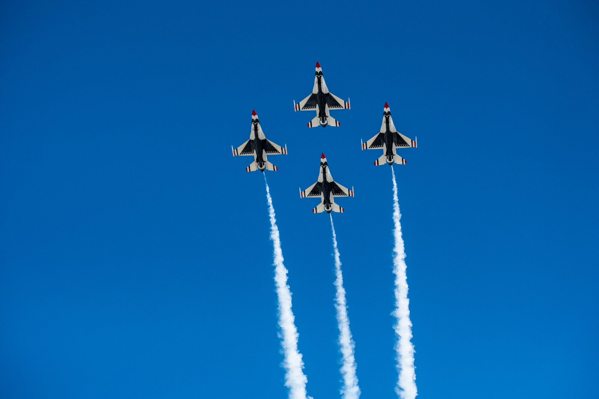 Members of the U.S. Thunderbirds perform for Team McConnell at the Frontiers in Flight Open House and Airshow Sept. 9, 2018, McConnell Air Force Base, Kan. In 1953 the Air Force activated the 3600th Demonstration Unit, which adopted the name “Thunderbirds,” establishing a 55-year heritage of displaying the capabilities of the most powerful Air Force in the world. (U.S. Air Force Photo by Staff Sgt. Preston Webb)