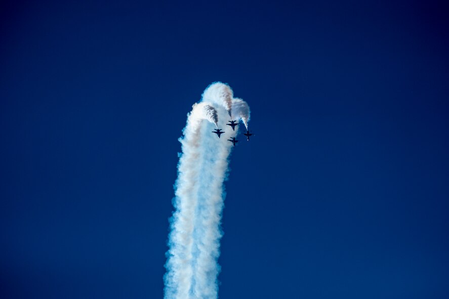 Members of the U.S. Thunderbirds perform for Team McConnell at the Frontiers in Flight Open House and Airshow Sept. 9, 2018, McConnell Air Force Base, Kan. In 1953 the Air Force activated the 3600th Demonstration Unit, which adopted the name “Thunderbirds,” establishing a 55-year heritage of displaying the capabilities of the most powerful Air Force in the world. (U.S. Air Force Photo by Staff Sgt. Preston Webb)