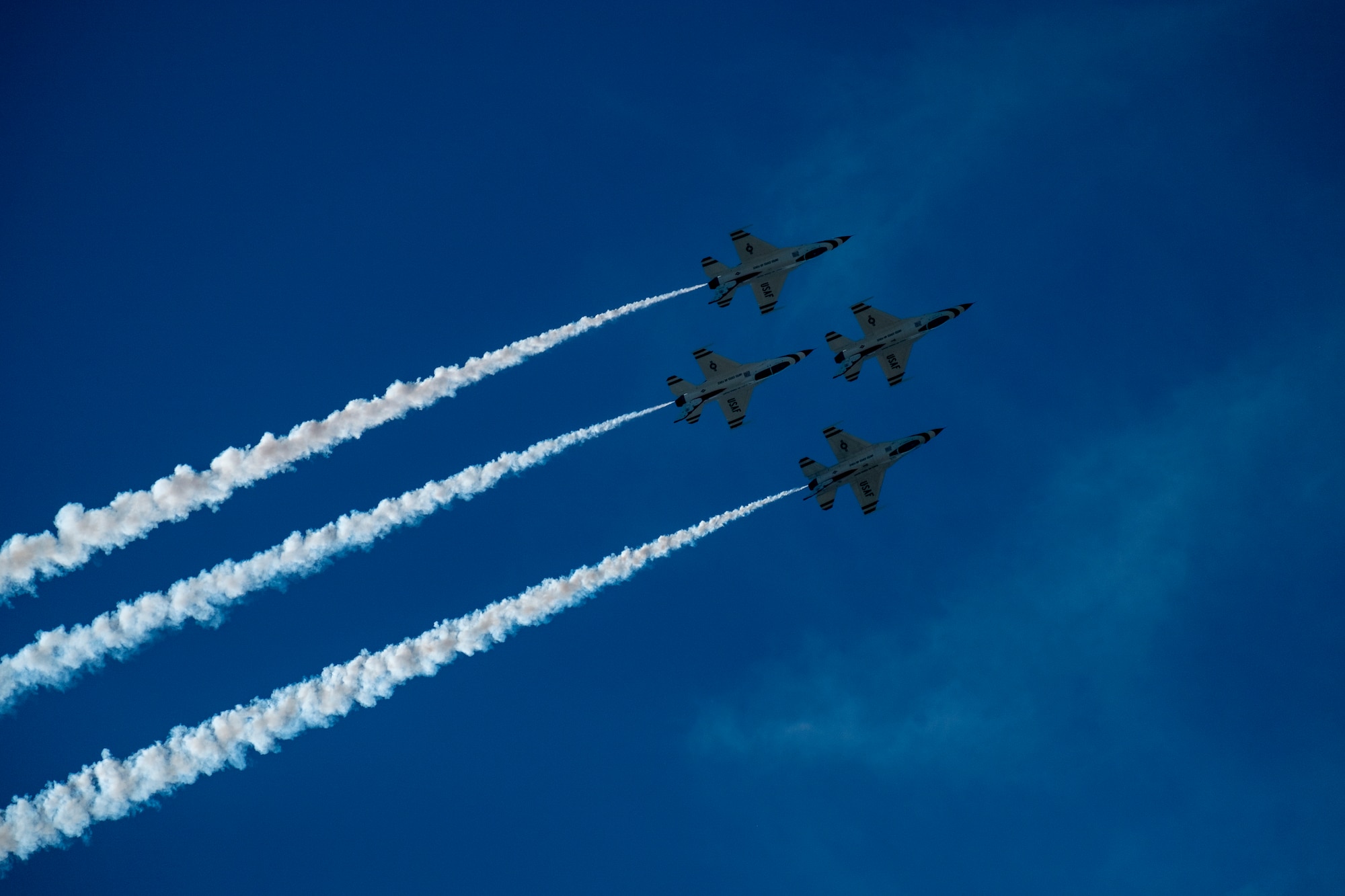 Members of the U.S. Thunderbirds perform for Team McConnell at the Frontiers in Flight Open House and Airshow Sept. 9, 2018, McConnell Air Force Base, Kan. In 1953 the Air Force activated the 3600th Demonstration Unit, which adopted the name “Thunderbirds,” establishing a 55-year heritage of displaying the capabilities of the most powerful Air Force in the world. (U.S. Air Force Photo by Staff Sgt. Preston Webb)