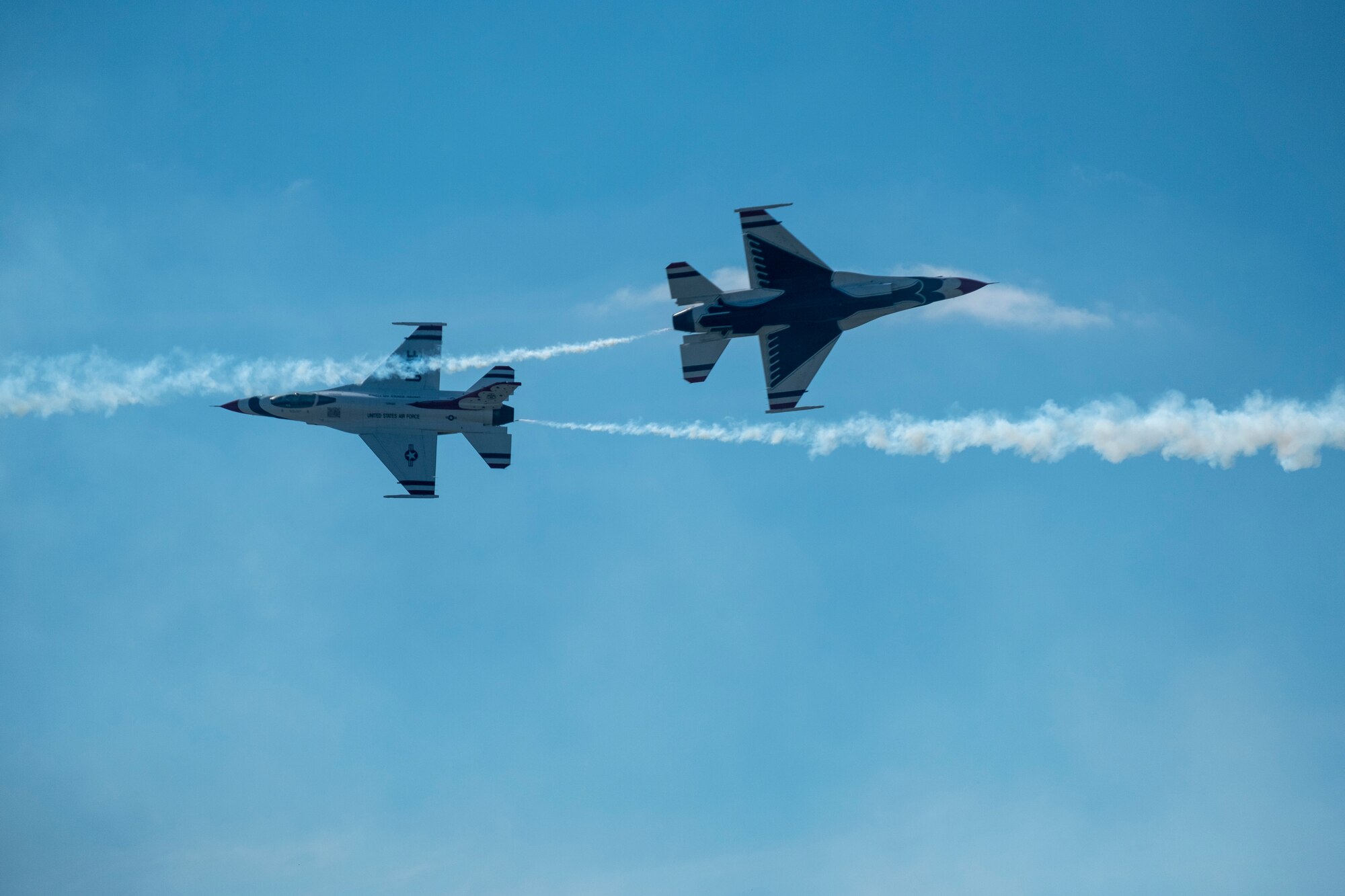 Members of the U.S. Thunderbirds perform for Team McConnell at the Frontiers in Flight Open House and Airshow Sept. 9, 2018, McConnell Air Force Base, Kan. In 1953 the Air Force activated the 3600th Demonstration Unit, which adopted the name “Thunderbirds,” establishing a 55-year heritage of displaying the capabilities of the most powerful Air Force in the world. (U.S. Air Force Photo by Staff Sgt. Preston Webb)