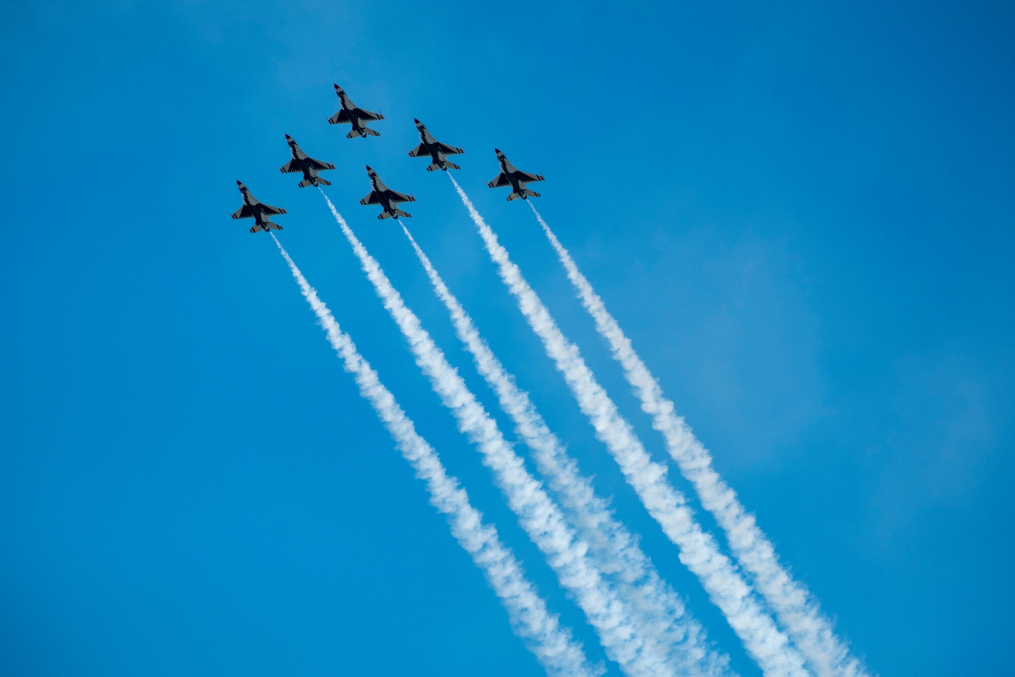 Members of the Thunderbirds Demonstration Squadron perform for Team McConnell  at the Frontiers in Flight Open House and Airshow Sept. 9, 2018, McConnell Air Force Base, Kan. In 1953 the Air Force activated the 3600th Demonstration Unit, which adopted the name “Thunderbirds,” establishing a 55-year heritage of displaying the capabilities of the most powerful Air Force in the world. (U.S. Air Force Photo by Staff Sgt. Preston Webb)