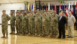 FORT KNOX, KY - Over 30 members of the 1st Theater Sustainment Command said goodbye to their families, friends, and unit team members Nov 30 at a deployment ceremony held at the Sadowski center here on post. The team is comprised of Soldiers and Department of the Army Civilians, deployed to Kuwait where they will assume the Strategic Operations and Plans mission. The members known as the White Team will replace the Red Team, which is scheduled to redeploy in mid December.