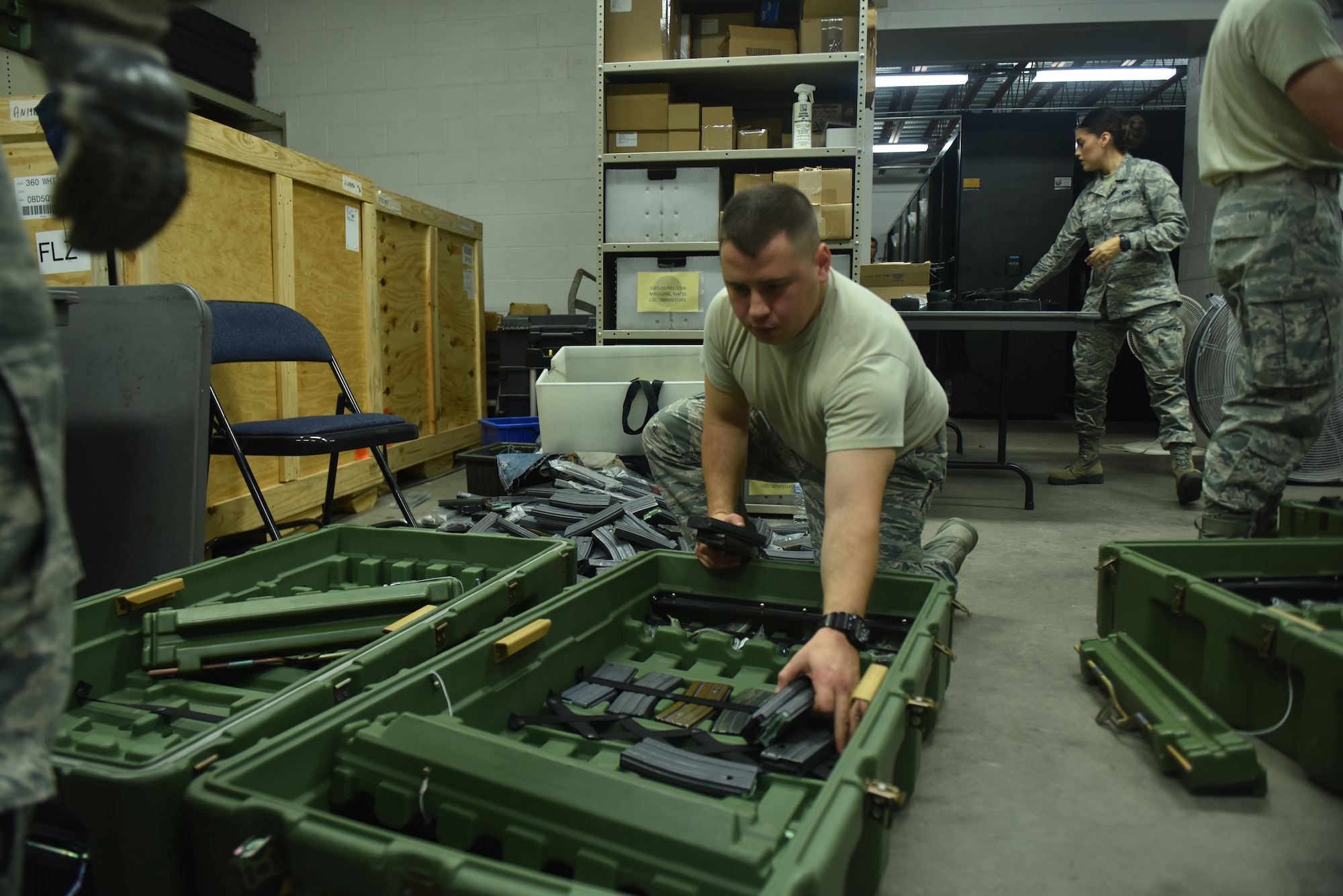 Members of the 509th Logistics Readiness Squadron at Whiteman Air Force Base, Missouri prepare to ship one of the largest small arms loads of the year.