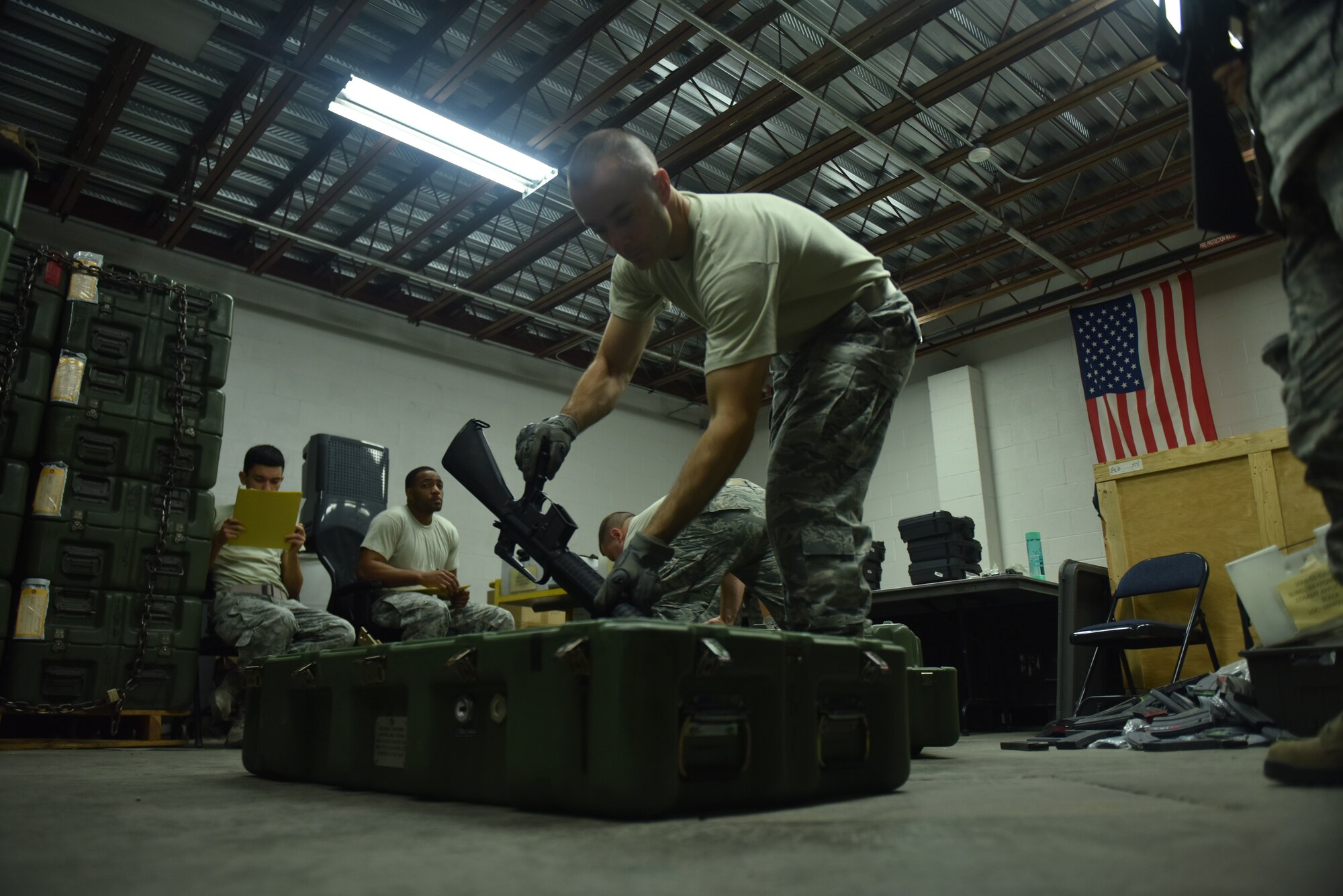 Members of the 509th Logistics Readiness Squadron at Whiteman Air Force Base, Missouri prepare to ship one of the largest small arms loads of the year.