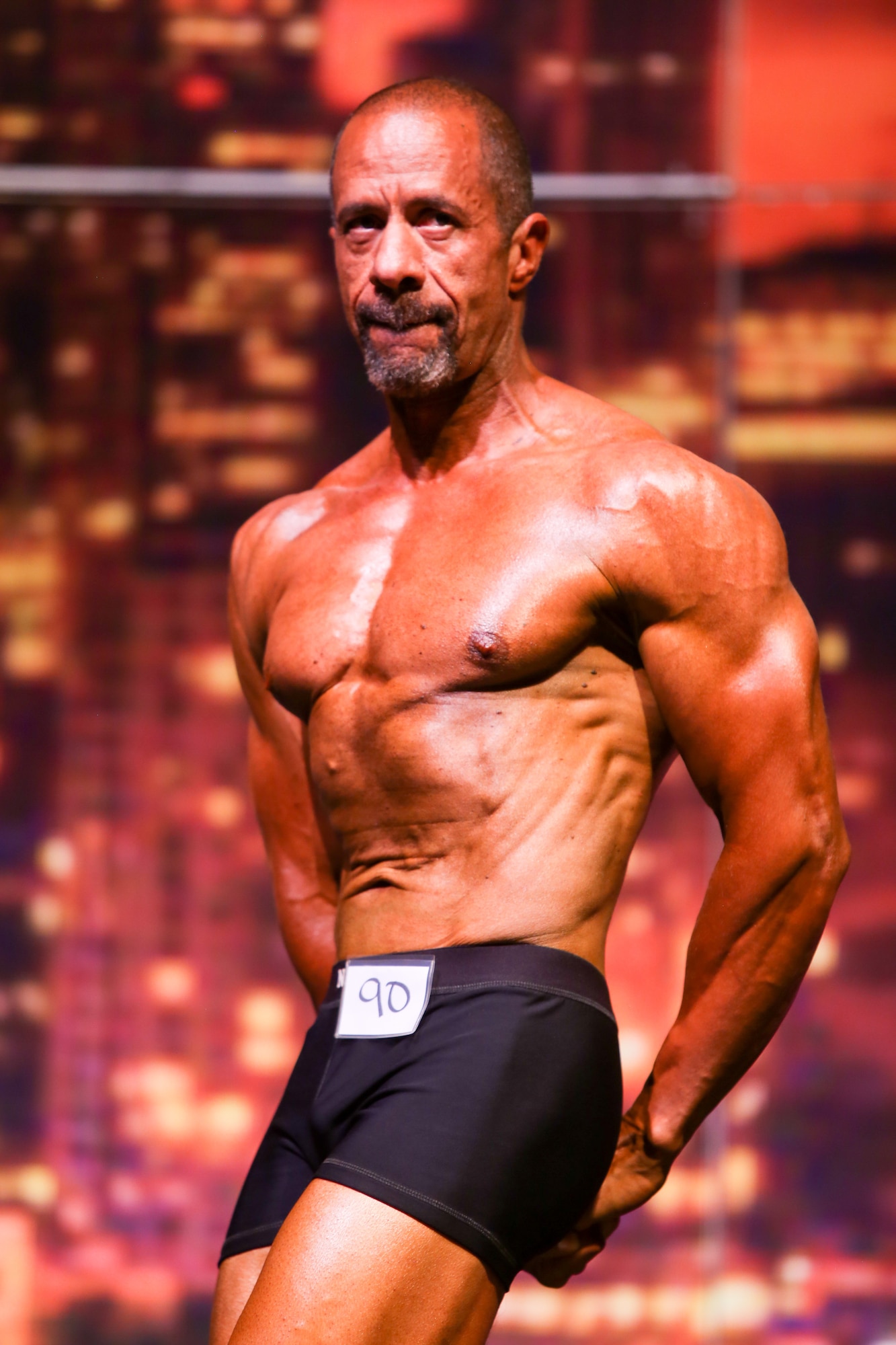 Richard Gonzales, 225th Air Defense Group personnel specialist, wins first place in the Classic Men’s Physique Masters 50 & Older class at the Washington State Championship for bodybuilding at the Auburn Performing Arts Center in Auburn, Aug. 4, 2018. (Courtesy Photo by Richard Gonzales)