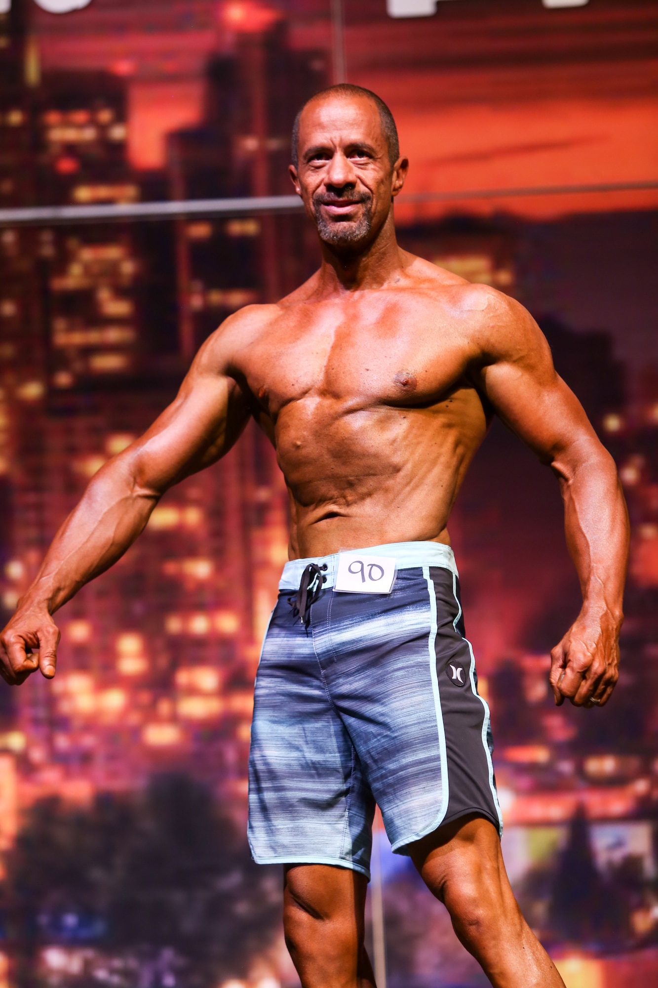 Richard Gonzales, 225th Air Defense Group personnel specialist, wins first palce in the Men’s Physique Masters 50 & Older class at the Washington State Championship for bodybuilding at the Auburn Performing Arts Center in Auburn, Aug. 4, 2018. (Courtesy Photo by Richard Gonzales)
