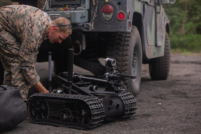 Sgt. Brett E. Ellis prepares a Mark II Talon Explosive Ordnance Disposal robot Sept. 5, 2018 at Camp Fuji, Japan. EOD Marines trained to safely dispose of Improvised Explosives Devices with the Mark II Talon EOD robot while preparing for worldwide mission deployment in support of III Marine Expeditionary Force. Ellis, a native of Overland Park, Kansas, is an EOD Technician with EOD Company, 9th Engineer Support Battalion, 3rd Marine Logistics Group. (U.S. Marine Corps photo by Pfc. Mark Fike)