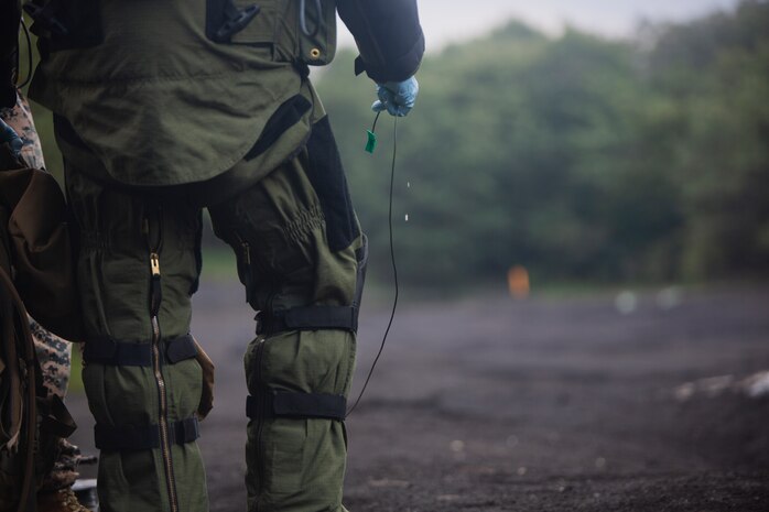 Sgt. Scott N. Schaller prepares to observe a test Improvised Explosive Device detonation Sept. 5, 2018 at Camp Fuji, Japan. Explosive Ordnance Disposal Marines prepared for worldwide mission deployment in support of III Marine Expeditionary Force by testing their ability to disable and dispose of explosives. Schaller, a native of Easton, Pennsylvania, is an EOD Technician with EOD Company, 9th Engineer Support Battalion, 3rd Marine Logistics Group. (U.S. Marine Corps photo by Pfc. Mark Fike)