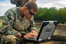 Sgt. Christopher J. Piette examines data from a post-blast analysis Sept. 6, 2018 at Camp Fuji, Japan. PBAs allow Marines to determine if the explosives have been properly disposed of, their composition and the direction they came from. Explosive Ordnance Disposal Marines prepared for worldwide mission deployment in support of III Marine Expeditionary Force by testing their ability to disable and dispose of explosives. Piette, a native of Green Bay, Wisconsin, is an EOD technician with EOD Company, 9th Engineer Support Battalion, 3rd Marine Logistics Group. (U.S. Marine Corps photo by Pfc. Mark Fike)