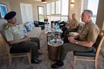 with Bangladeshi Lt. Gen. Mahfuzur Rahman, Principal Staff Officer under Prime Minister's Office and head of Armed Forces Division, during the Indo-Pacific Chief of Defense conference in Waikiki, Hawaii, Sept. 10, 2018. (DOD photo by U.S. Navy Petty Officer 1st Class Dominique A. Pineiro)