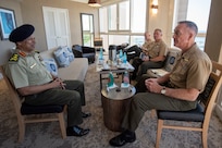 with Bangladeshi Lt. Gen. Mahfuzur Rahman, Principal Staff Officer under Prime Minister's Office and head of Armed Forces Division, during the Indo-Pacific Chief of Defense conference in Waikiki, Hawaii, Sept. 10, 2018. (DOD photo by U.S. Navy Petty Officer 1st Class Dominique A. Pineiro)