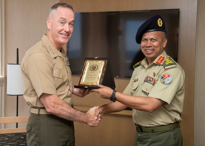 with Bangladeshi Lt. Gen. Mahfuzur Rahman, Principal Staff Officer under Prime Minister's Office and head of Armed Forces Division, during the Indo-Pacific Chief of Defense conference in Waikiki, Hawaii, Sept. 10, 2018. (DOD photo by U.S. Navy Petty Officer 1st Class Dominique A. Pineiro)
