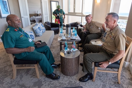 Marine Corps Gen. Joe Dunford, chairman of the Joint Chiefs of Staff, meets with Papua New Guinea Army Brig. Gen. Gilbert Toropo, Commander, Papua New Guinea Defence Force, during the Indo-Pacific Chief of Defense conference in Waikiki, Hawaii, Sept. 10, 2018.