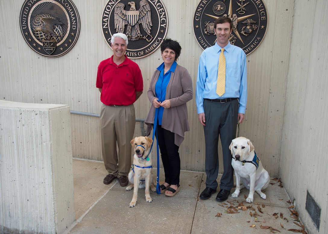 (From L to R) Pete Geoghan, Sharon Shoemaker with Zeppelin, and John Barbare with Coby.