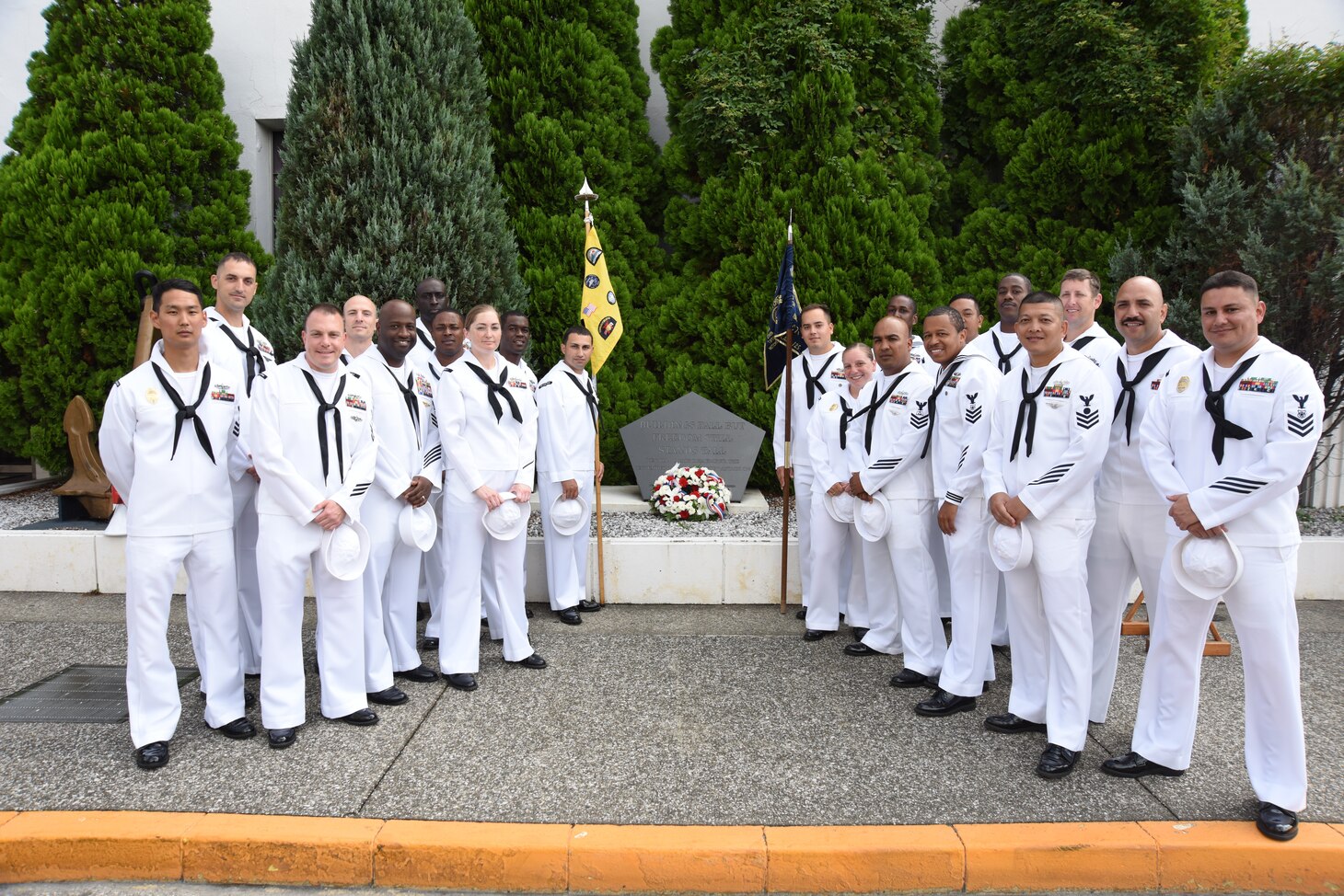 FLEET ACTIVITIES YOKOSUKA, Japan (Sept. 11, 2018) Chief petty officer selectees from Yokosuka-area commands gather at a memorial in front the Chief Petty Officer Club to commemorate the 17th anniversary of the Sept. 11 terrorist attack. Dozens of chief petty officers and selectees from USS Blue Ridge (LCC 19), U.S. 7th Fleet, Commander, Submarine Group 7, Commander, Fleet Activities Yokosuka and Commander, Naval Surface Group Western Pacific participated in the memorial ceremony, which included morning colors, a wreath-laying and first-hand accounts.