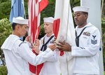 FLEET ACTIVITIES YOKOSUKA, Japan (Sept. 11, 2018) Chief petty officer selectees from Yokosuka-area commands perform morning colors at the Commander, Naval Forces Japan flagpole as part of a ceremony to commemorate the 17th anniversary of the Sept. 11 terrorist attack. Dozens of chief petty officers and selectees from USS Blue Ridge (LCC 19), U.S. 7th Fleet, Commander, Submarine Group 7, Commander, Fleet Activities Yokosuka and Commander, Naval Surface Group Western Pacific participated in the memorial ceremony, which also included a wreath-laying and first-hand accounts.