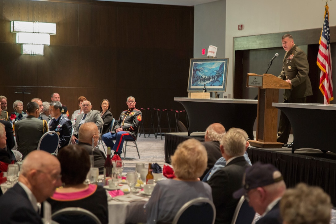 Brig. Gen. Michael S. Cederholm, Deputy Commander, U.S. Marine Corps Forces Command, speaks before veterans of the Battle of the Chosin Reservoir and their families during a reunion in Norfolk, Va., Sept. 8. Cederholm thanked them for their service and assured them the Marines who follow in their footsteps carry on the same values today. 'The Chosin Few' gather together annually to pay respects to their fallen brothers and to share stories of their experiences during the Korean War. (Official U.S. Marine Corps photo by Chris Jones/Released)