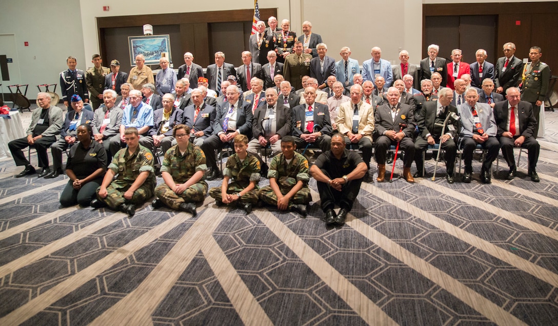 Brig. Gen. Michael S. Cederholm, Deputy Commander, U.S. Marine Corps Forces Command, speaks before veterans of the Battle of the Chosin Reservoir and their families during a reunion in Norfolk, Va., Sept. 8. Cederholm thanked them for their service and assured them the Marines who follow in their footsteps carry on the same values today. 'The Chosin Few' gather together annually to pay respects to their fallen brothers and to share stories of their experiences during the Korean War. (Official U.S. Marine Corps photo by Chris Jones/Released)