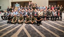 Brig. Gen. Michael S. Cederholm, Deputy Commander, U.S. Marine Corps Forces Command, speaks before veterans of the Battle of the Chosin Reservoir and their families during a reunion in Norfolk, Va., Sept. 8. Cederholm thanked them for their service and assured them the Marines who follow in their footsteps carry on the same values today. 'The Chosin Few' gather together annually to pay respects to their fallen brothers and to share stories of their experiences during the Korean War. (Official U.S. Marine Corps photo by Chris Jones/Released)