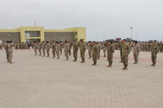 Brig. Gen. Pablo Muller Barbería, and U.S. Army Col. Rafael Rodriguez, salute troops during the closing ceremony of Southern Star.