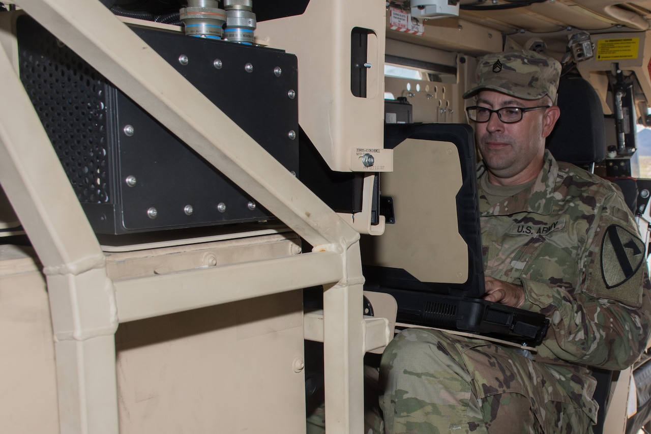 Army Staff Sgt. Jason Millhouse, 3rd Armored Brigade Combat Team, 1st Cavalry Division, programs the frequencies needed to jam a notional enemy during training on the Army’s new electronic warfare tactical vehicle in Yuma, Arizona, Aug. 16, 2018. The new vehicle was developed to provide Army electronic warfare teams with the ability to sense and jam enemy communications and networks from an operationally relevant range at the brigade combat team level. Army photo