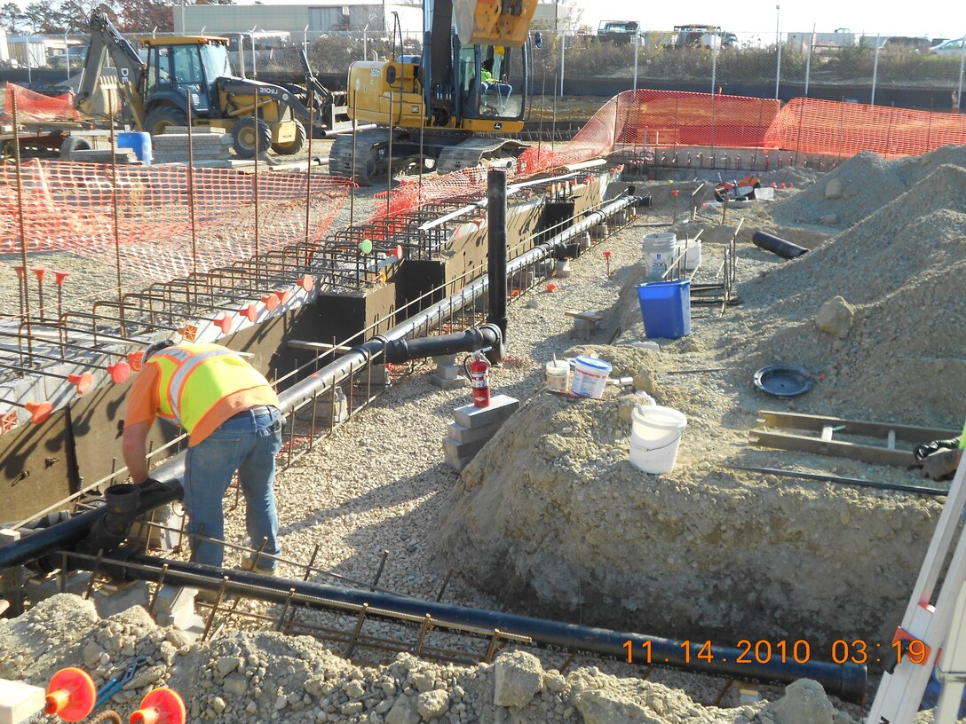 A Contractor installs rebar for the Price Landfill Groundwater Treatment Plant concrete foundation. The USACE Philadelphia
District constructed the facility on behalf of the Environmental Protection Agency. Groundwater treatment and monitoring are ongoing.