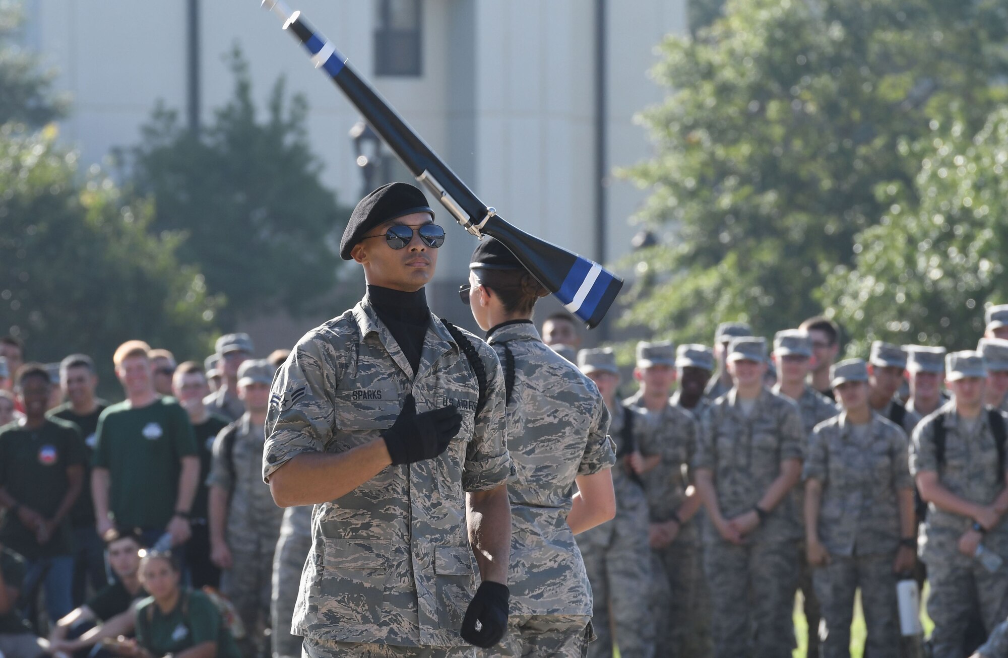 U.S. Air Force Airman 1st Class Rocky Sparks, 334th Training Squadron freestyle drill team member, performs during the 81st Training Group drill down on the Levitow Training Support Facility drill pad at Keesler Air Force Base, Mississippi, Sept. 7, 2018. Airmen from the 81st TRG competed in a quarterly open ranks inspection, regulation drill routine and freestyle drill routine. (U.S. Air Force photo by Kemberly Groue)